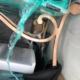 Metal chair on top of wood