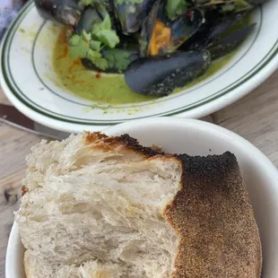 Green curry mussels and bomb charred rustic bread