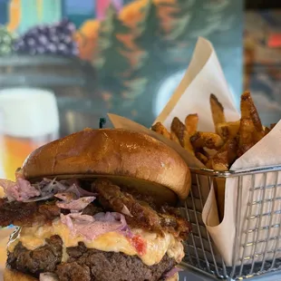 The Carolina Burger.  Fried Green Tomato, Cilantro ColeSlaw, Pickled Onions and our house made Pimento Cheese.