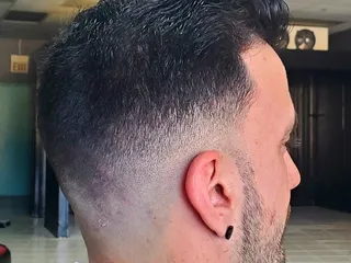 The Cave Barber Shop and Parlor