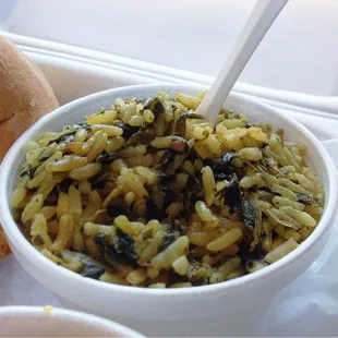The owner&apos;s secret recipe rice and greens - absolutely delicious!