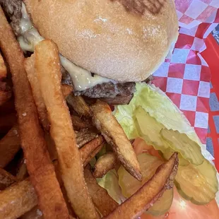 Hamburger, with Gouda cheese and fries.