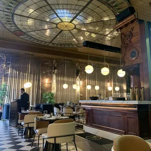 Stained glass fixture is amazing and the art deco feel is fun and fabulous