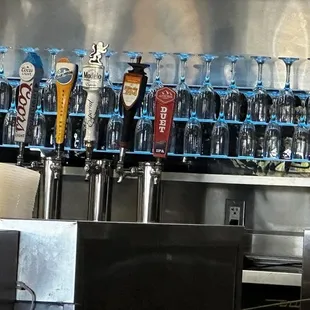  row of glasses on a shelf