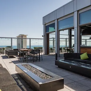 a patio with a view of the ocean