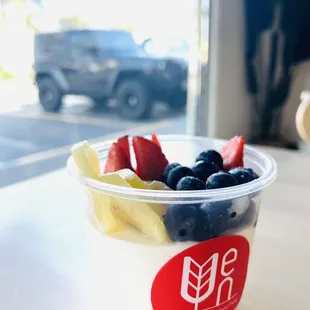a yogurt filled with fruit