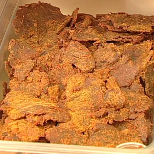 a tray of beef strips