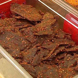 a tray of beef strips