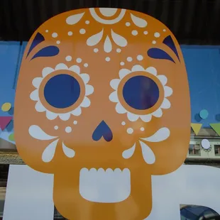 A giant Mexican skull on the front windows.