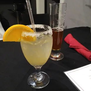 a glass of lemonade and a glass of beer