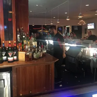 people sitting at the bar