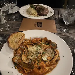 a plate of pasta with clams