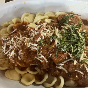 Braciole. Flank steak marinated in tomato and stuffed, w/cavaletti pasta