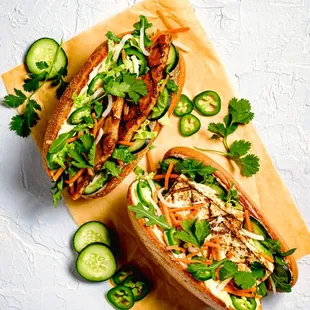 Bánh mi: baguette, green leaf spring mix, house-made pâté, house-made mayo, pickled daikon and carrot, cucumber, jalapeño and fresh cilantro