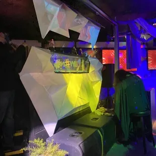 a group of people sitting at a bar