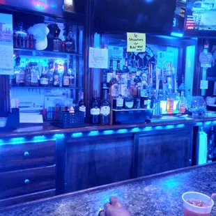 a person sitting at a bar