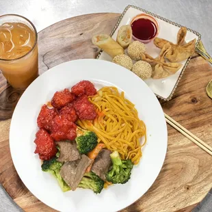 General Tao Chicken and Broccoli Beef served with lo mein.