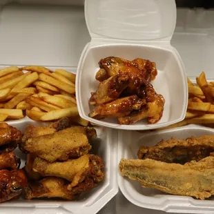 chicken wings, french fries, and sauce