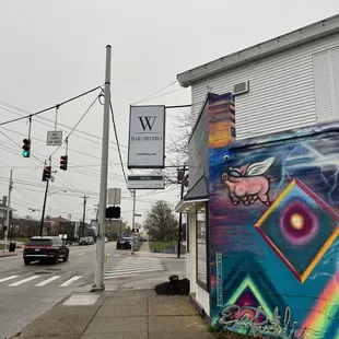 a colorful mural on the side of a building