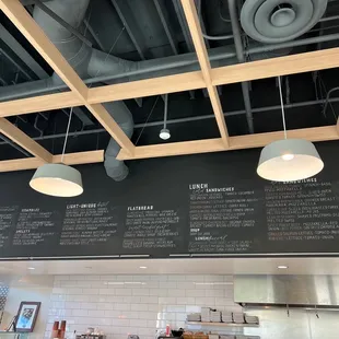 menus on the wall of the restaurant