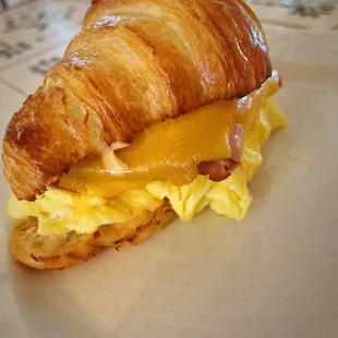 Wake up Call - 2 eggs, ham, cheddar and chipotle mayo on a buttery croissant