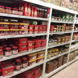 Variety of different pastes. Kkong dowin jang, gochijang, soybean pastes and soup stock.