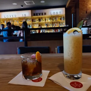 two cocktails on a table