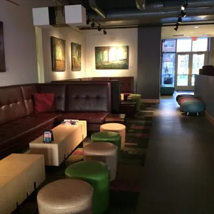 a row of stools and tables