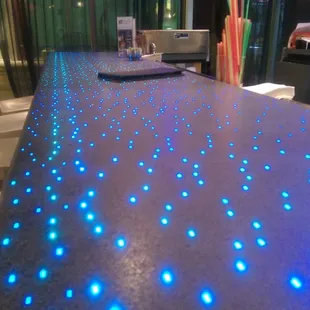 Sweet color changing lights built into the bar top.