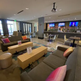 lounge area with couches and tables