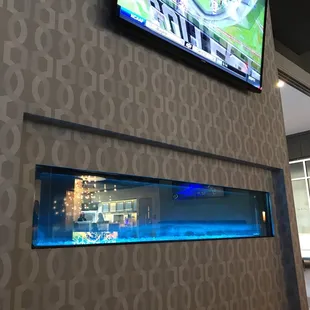 a tv mounted on the wall