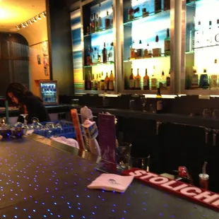 people sitting at the bar