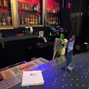 a bar with neon lights