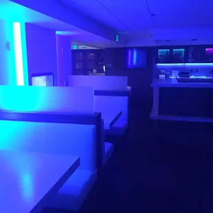 Patrons can display their iPhone's content on the TVs on the left wall using AirPlay