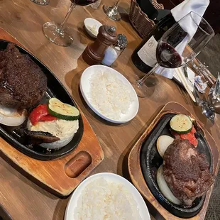 Our dinner, rib eye and filet mignon cooked medium rare.