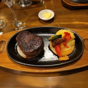 Course 4: filet mignon with mashed potato (served on top of delicious onions to prevent burning from the sizzling plate)