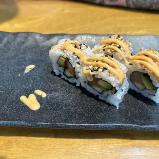 Spicy salmon roll - half eaten