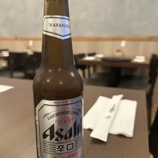 a bottle of beer on a table