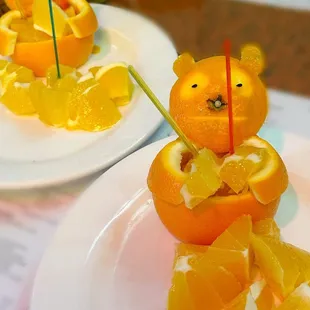 Dessert presentation of oranges.