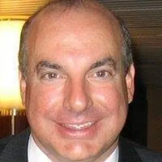 Mark E.