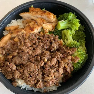 a bowl of meat, rice, and broccoli
