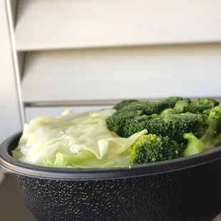 a bowl of broccoli and cabbage