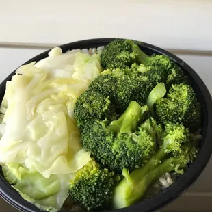 a bowl of broccoli and cabbage