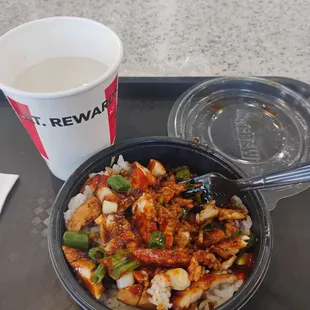 no extra chicken, just a regular mini bowl with nothing that I order including no carrots and jalapenos or taco. Just some very dry chicken.