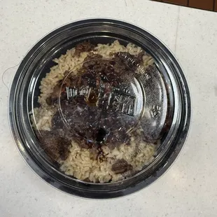 A steak bowl with not even enough meat