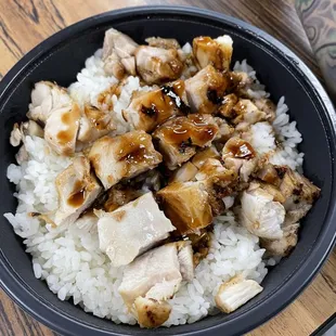 a bowl of chicken and rice
