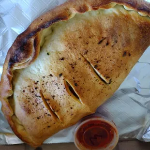 Stromboli with requested marinara.