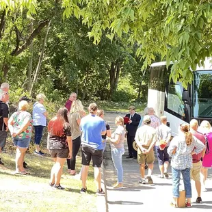 boarding the Guided Gangster Bus Tour.  2022