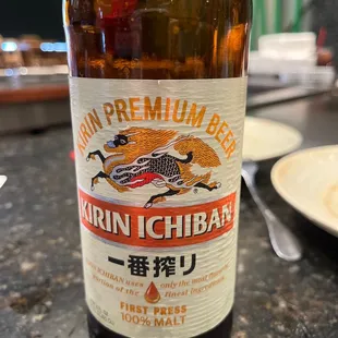 a bottle of beer on a table