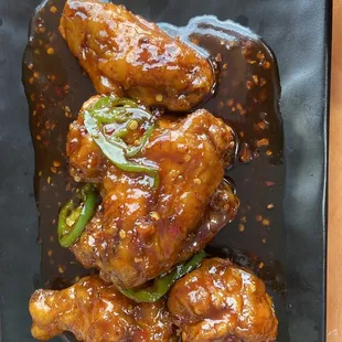 This was an appetizer...don't recall the name. But it was spicy chicken wings with jalapeños.